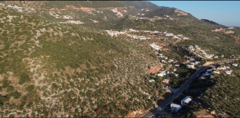 KAŞ BEZİRGAN KALKAN YOLU ÜZERİNDE DENİZ MANZARALI ARAZİ