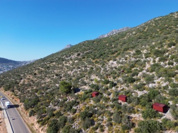 KAŞ BEZİRGAN KALKAN YOLU ÜZERİNDE DENİZ MANZARALI ARAZİ