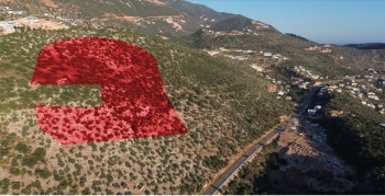 KAŞ BEZİRGAN KALKAN YOLU ÜZERİNDE DENİZ MANZARALI ARAZİ